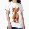 majestic elephant rendered in stylized 2D digital art with warm terracotta, orange, ivory, mint green, and yellow tones, — graphic tee